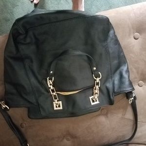 Black leather satchel with gold chains